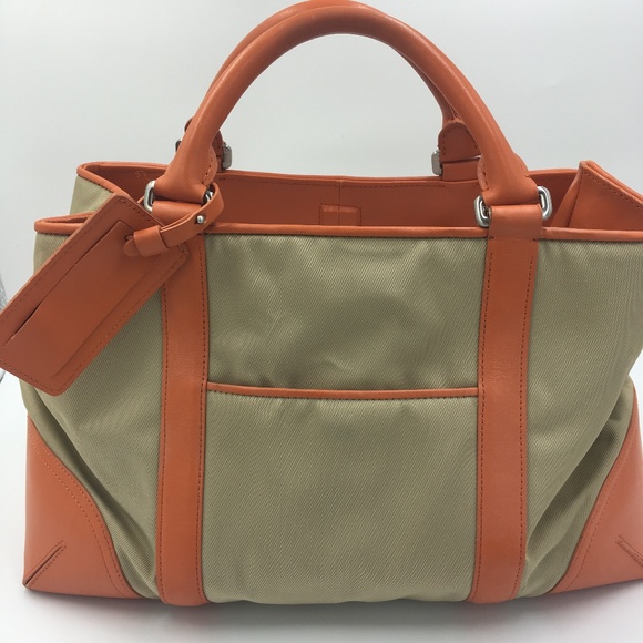 Ann Taylor Handbags - Ann Taylor vegan leather satchel (orange/tan)